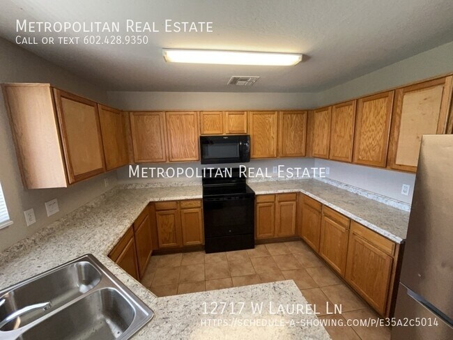 Building Photo - 12717 W Laurel Ln