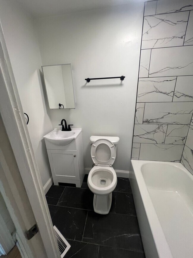 Building Photo - 209 Coltart Ave