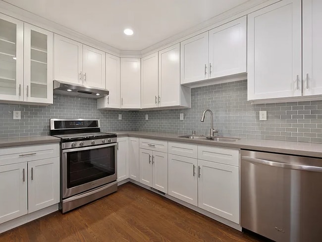 Building Photo - Renovated Duplex unit in the heart of Elmh...