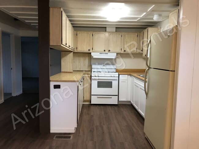 Building Photo - SPACIOUS THREE BEDROOM