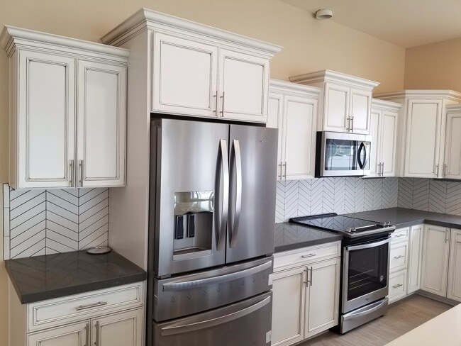 Building Photo - Occupied, do not disturb tenants. West Valley 3 bedroom 2.5 bath plus an office,  custom built re...