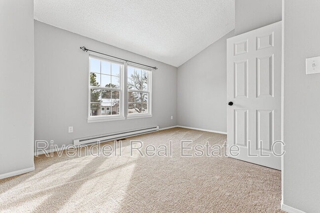 Building Photo - 9695 W Chatfield Ave