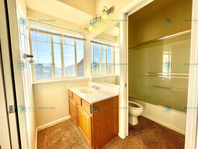 Building Photo - Stunning 3-Bedroom Townhome with Panoramic City Views, Upgraded Kitchen & Spacious Living in Nort...