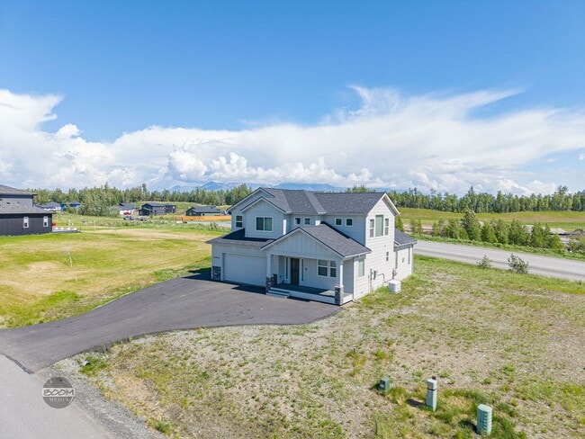 Building Photo - Premium 4BR Rental in The Ranch | Stunning Mountain Views | Easy Community Location | Automatic G...