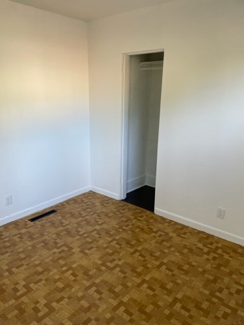 Main floor east looking bedroom - 1101 Newell St