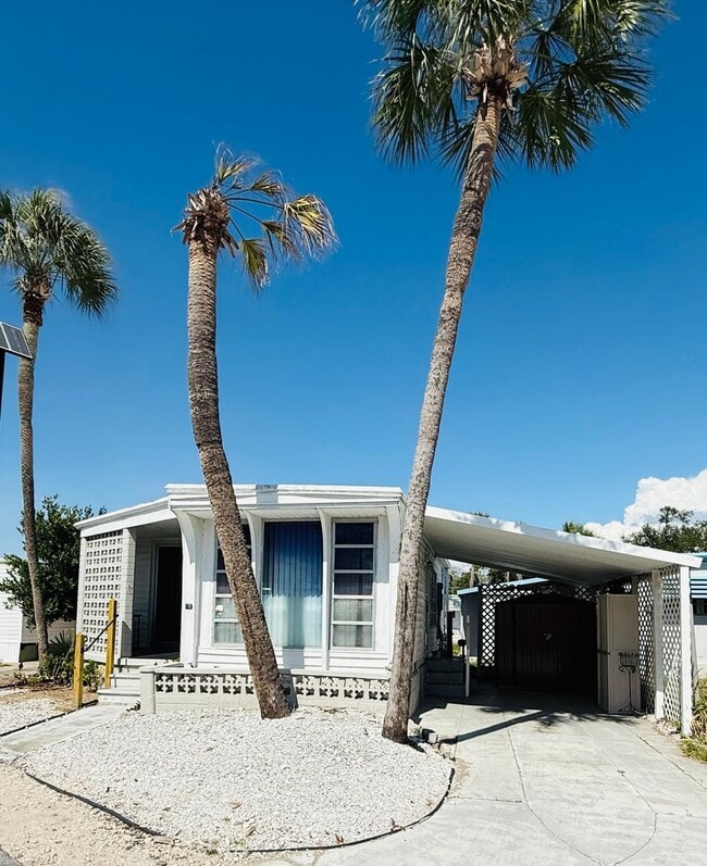 Building Photo - Beautiful fully furnished one bedroom, one bath manufactured home in a 55+ deed restricted gated ...