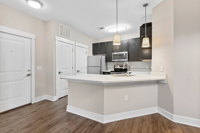 Kitchen with Pantry at Cottonwood Reserve Apartments - Cottonwood Reserve