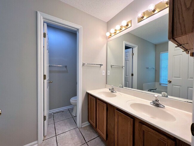 Building Photo - 6017 Tennyson Dr