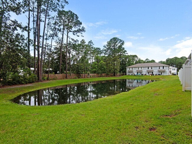 Building Photo - Brand New Furnished Townhome located just ...