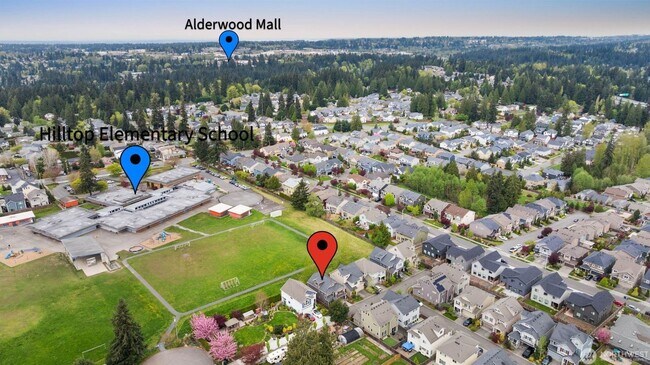 Building Photo - Modern Lynnwood Home with Flexible Bonus Space and Fenced Backyard