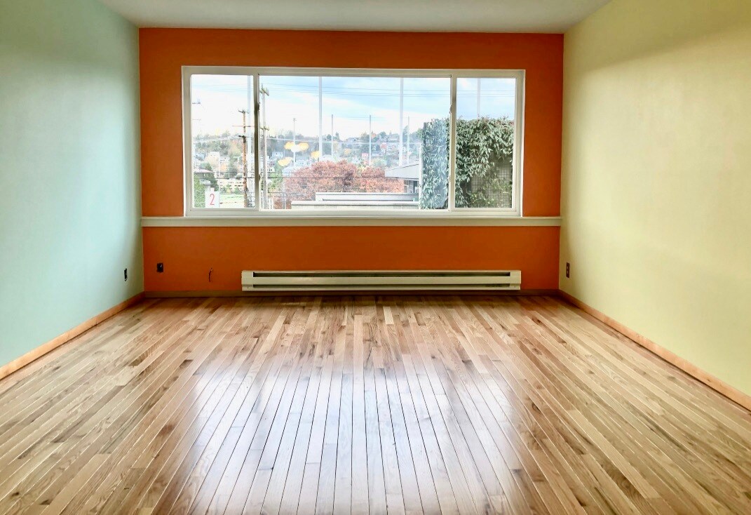 Large view window in spacious living room - 2801 14th Ave W