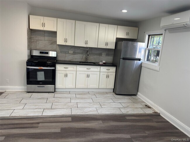 Building Photo - 219-07 Jamaica Ave