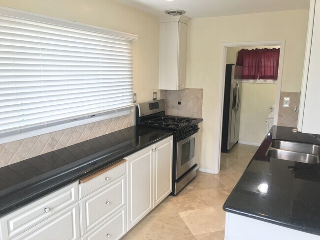 Building Photo - Beautiful Remodeled House with Large Fenced Lot and Big Garage