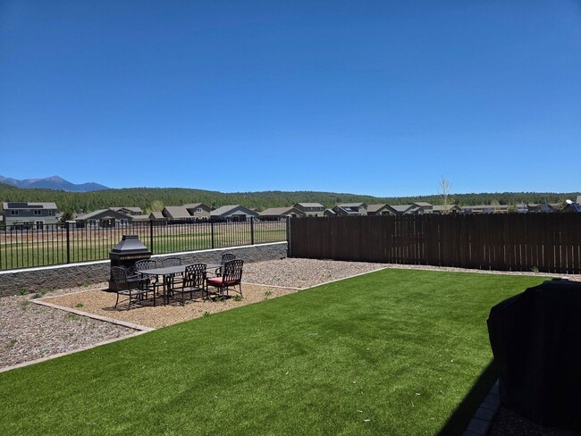 Building Photo - Coming in June!       Spacious 4 Bedroom Home in Bellemont | Fenced Backyard + 2 Car Garage