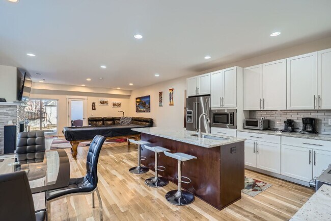 Building Photo - Available NOW! SIX MONTH LEASE - Spacious 3-Bedroom Townhouse with 3.5 Baths in Vibrant Sloans Lake!