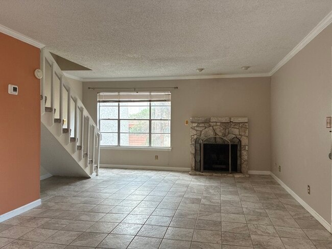 Building Photo - 1BR/1.5BA w/ Fireplace • Balcony • Pool Access in San Antonio