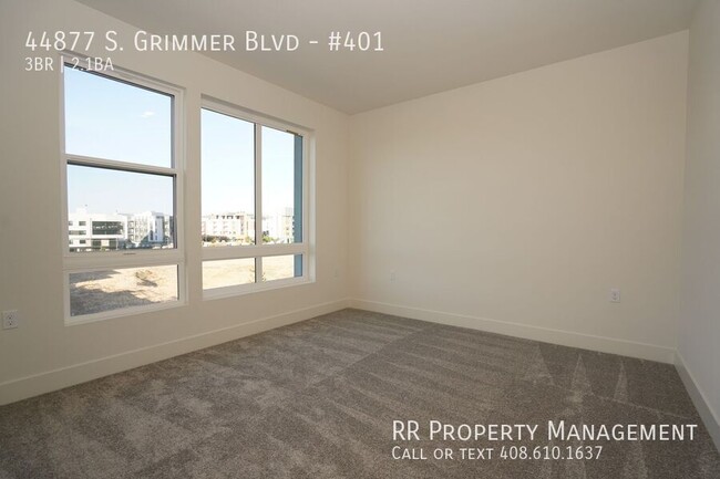 Building Photo - Brand New Top Floor Condo in Excellent Fre...