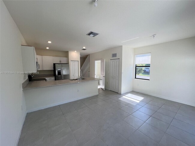 Building Photo - 11080 W 32nd Ln