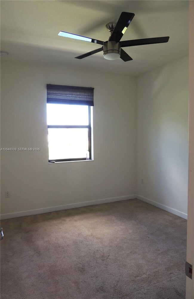 Building Photo - 9336 W 34th Ct