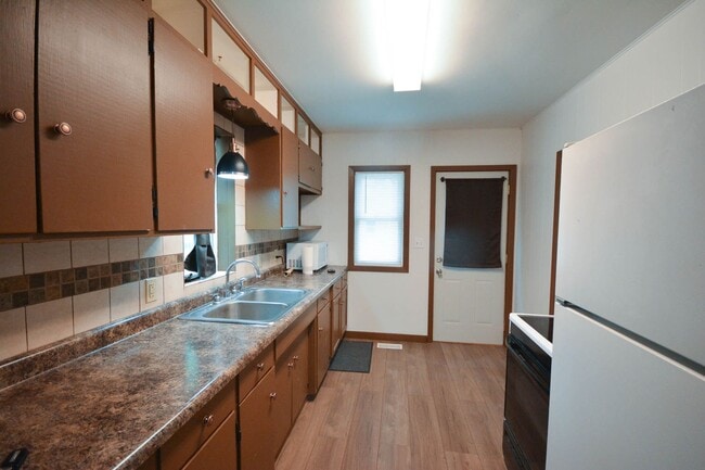 Building Photo - Adorable Austin home on corner lot with 2-car garage!