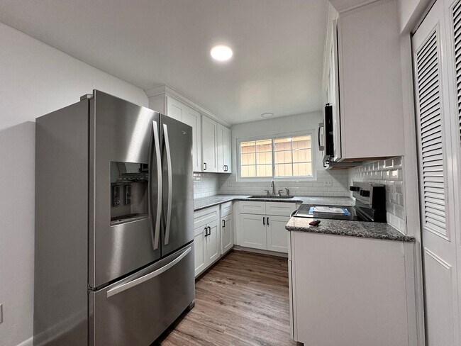 Building Photo - ** Coming Soon** Sandalwood Pool Home