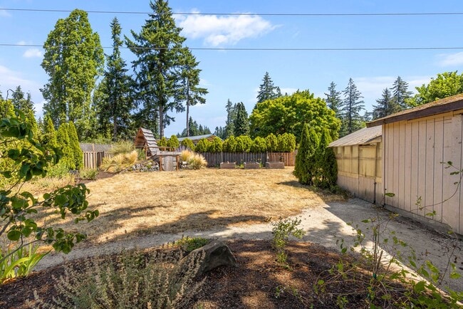 Building Photo - One-of-a-Kind Mid-Century Modern 4 Bedroom Retreat with Dream Backyard