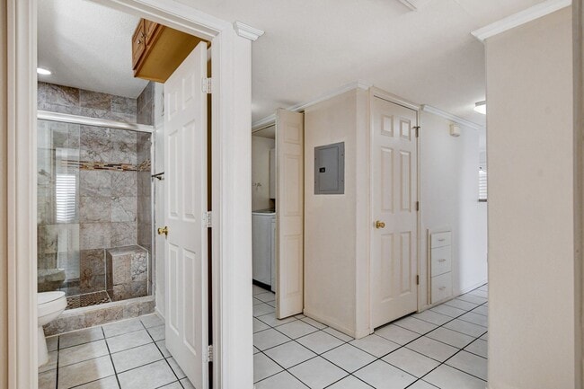 Building Photo - AMERICANA Property Mgmt - Gated 1st floor ...