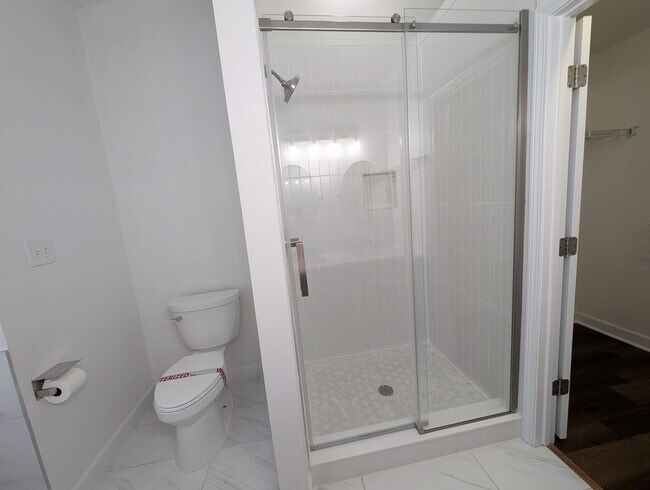 Building Photo - Pristine End Unit Townhome located in the Prosperity Place community!