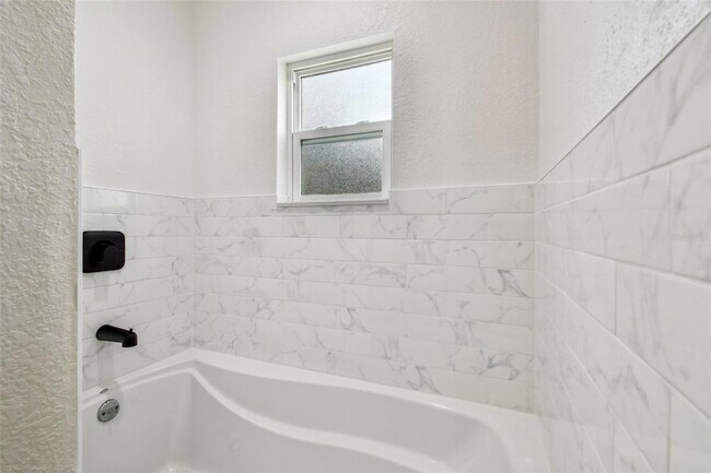 Building Photo - 4802 W Longfellow Ave