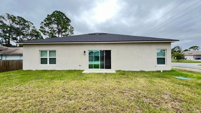 Building Photo - AVAILABLE NOW! 4 BD/2BA Home in Beautiful Palm Bay!! Wonderful home ready for move-in.