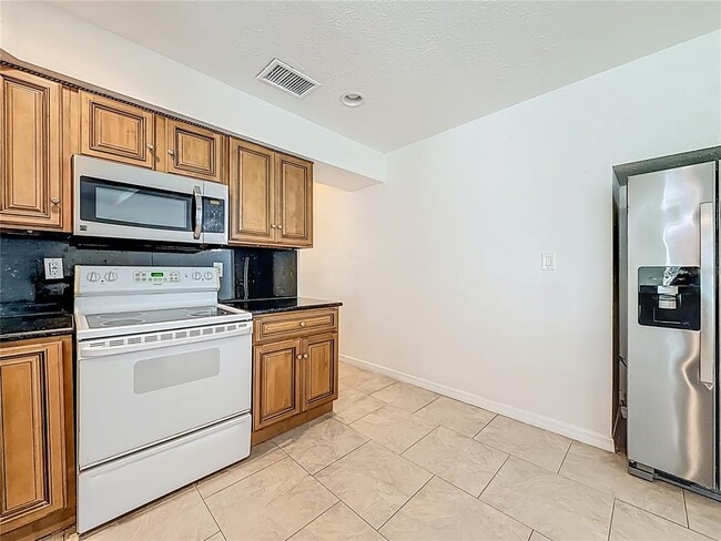 Building Photo - 7250 12th Ave N