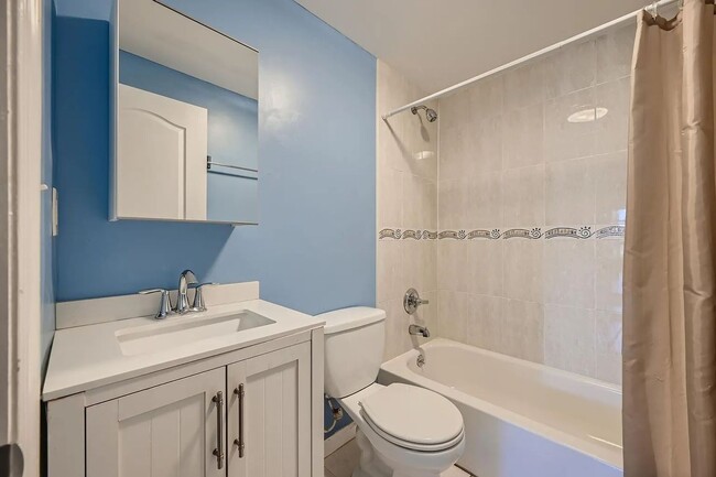 Building Photo - Charming 3 Bedroom/2.5 Bathroom Townhome in Patterson Park with Parking Pad!