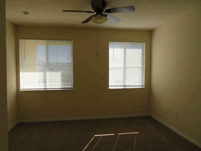 Bedroom with ceiling fan - 11016 Legacy Dr