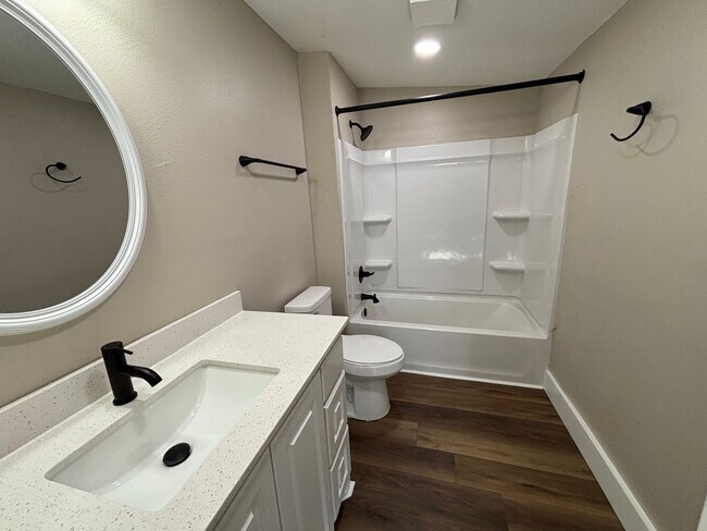 Building Photo - Welcome to this stunning new construction home located in the charming town of Atkins, AR.