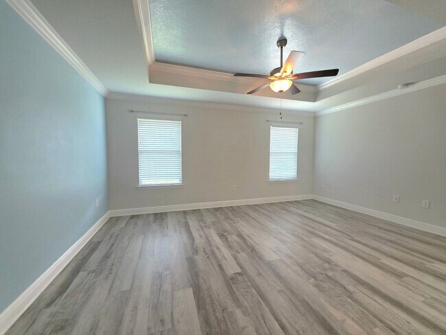 Building Photo - Bright, Open Layout | Screened Porch + Paver Patio | Move-In Ready