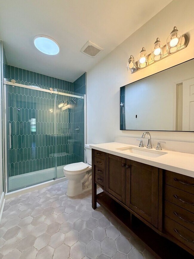 Building Photo - Charming West Nashville Condo with Designer Kitchen & Private Patio Access