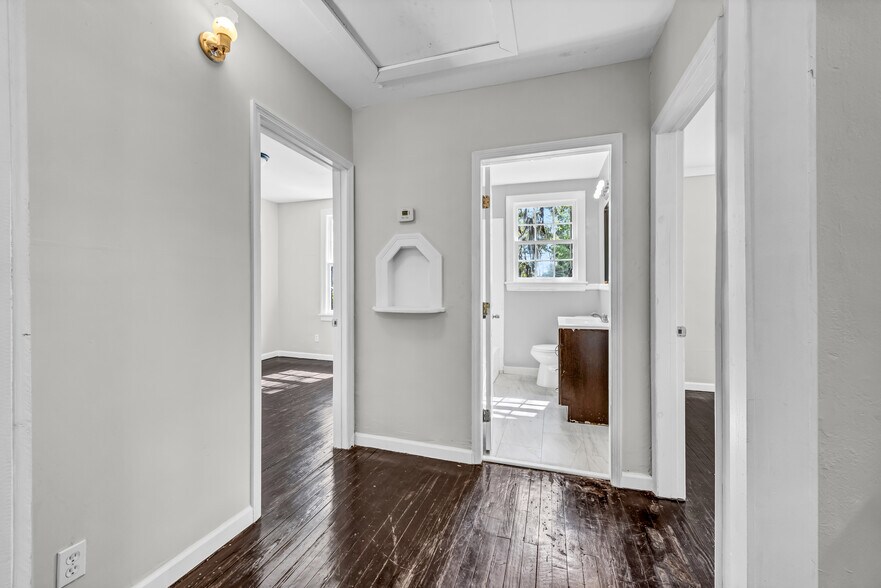 Head upstairs to find original hardwood floors and some classic charm retained in renovations - 844 E 37th St