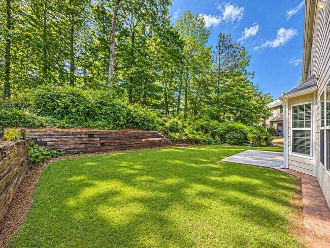 Building Photo - Clean 5 Bedroom Collins Hill Home with First Floor Suite and Oversized Master