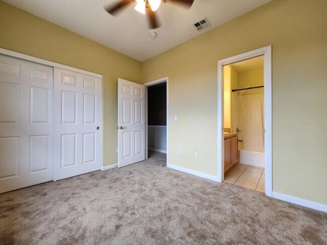 Building Photo - Modern 2BR/2.5BA Condo with Ensuite Bathro...