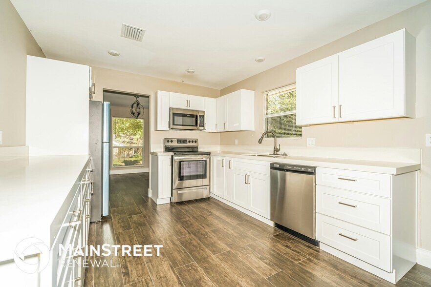 Building Photo - 10074 Woodhollow Dr