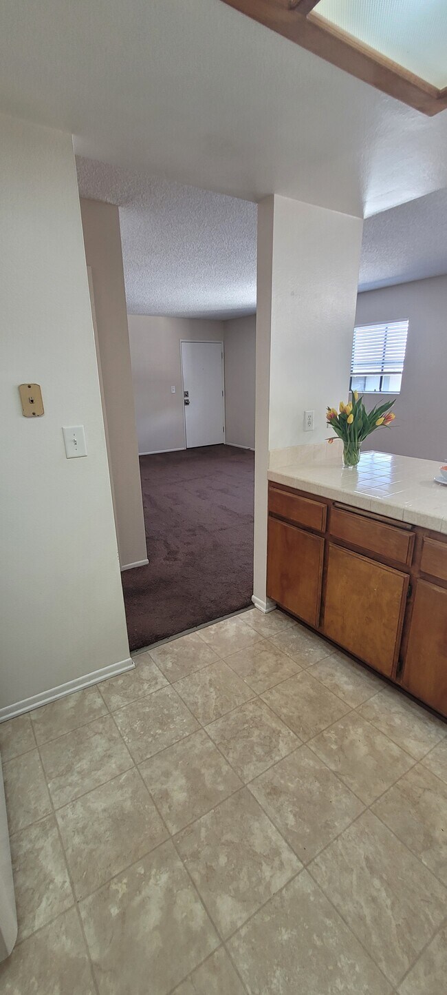 Kitchen to front room - 1571 W 207th St