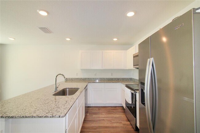 Building Photo - 10276 N Spaulding Dr