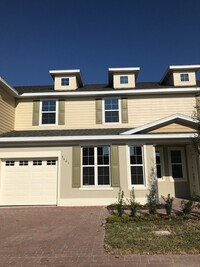 Building Photo - 4/2.5 Beautiful Energy Efficient Townhome ...