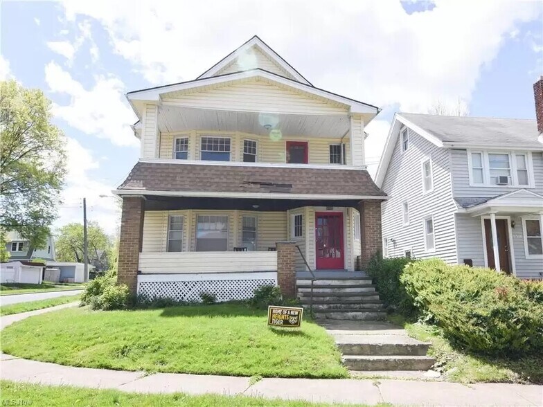The property offers a front and rear yard, outdoor living, and a dedicated garage parking spot. - 3320 Berkeley Rd