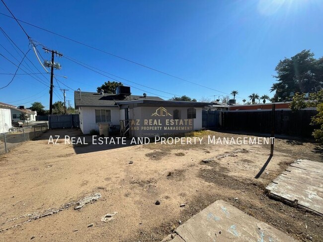 Building Photo - 7210 N 55th Dr