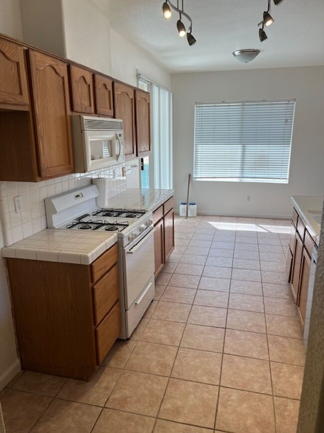 Building Photo - 4 Bedroom, 2 Bathroom Home with a Pool in ...