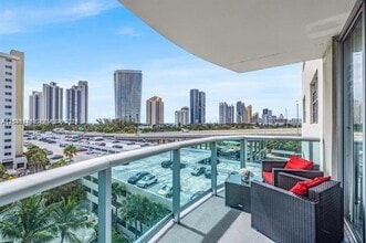 Building Photo - 19390 Collins Ave