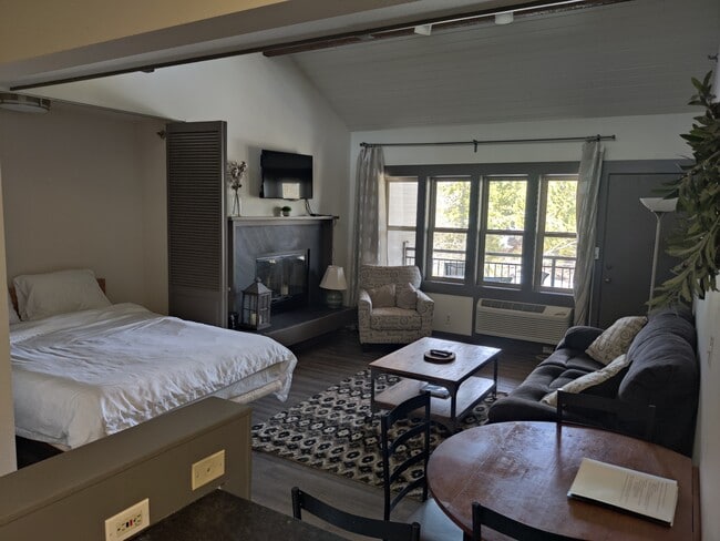 Murphy bed in living room - 18575 SW Century Dr