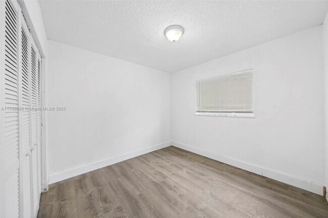 Building Photo - 4335 NW S Tamiami Canal Dr