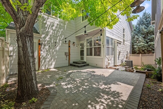 Building Photo - Stunning Tennyson Park Home | 4 Bedrooms, Finished Basement & Open Space Views
